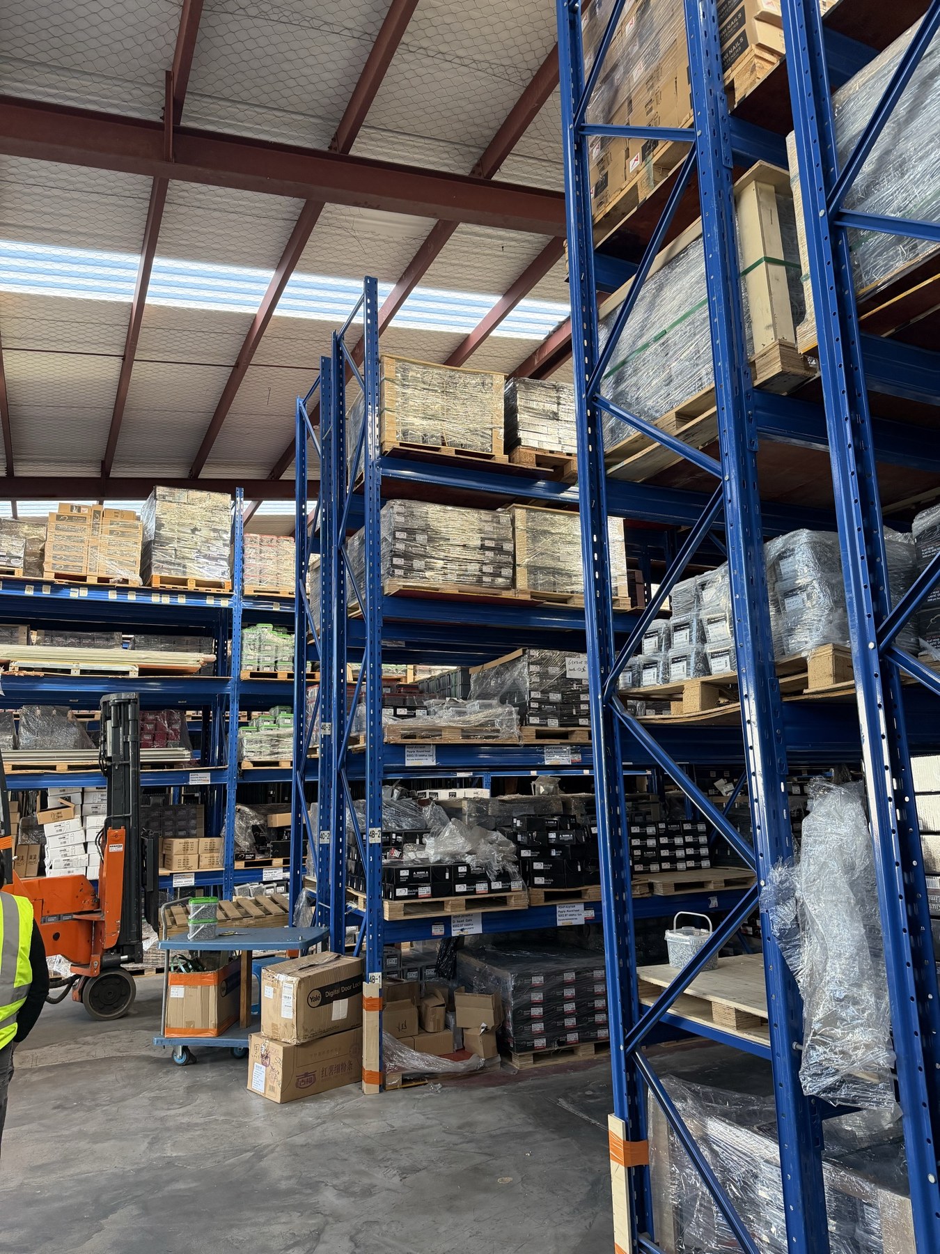 Kiwi Nails warehouse — pallet loading with forklift